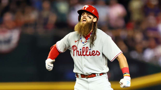 Oct 20, 2023; Phoenix, Arizona, USA; Philadelphia Phillies center fielder Brandon Marsh (16) celebrates after hitting an RBI double during the fifth inning against the Arizona Diamondbacks in game four of the NLCS for the 2023 MLB playoffs at Chase Field. Mandatory Credit: Mark J. Rebilas-USA TODAY Sports